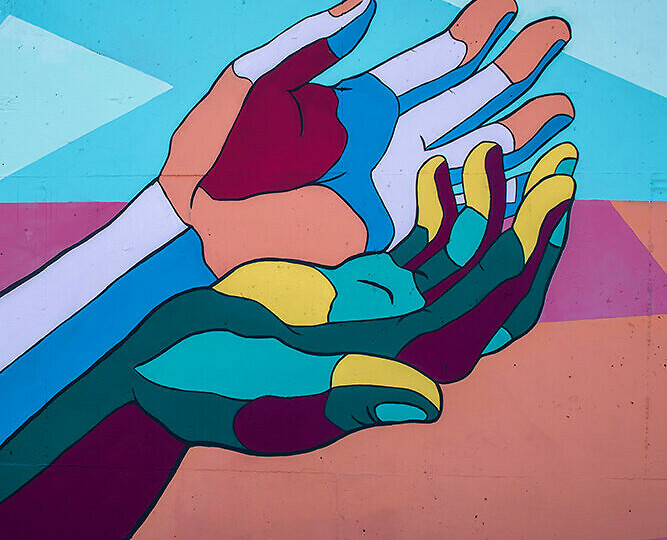 Abstracted representation of two hands reaching out.