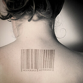 A woman's neck with a barcode printed on it.