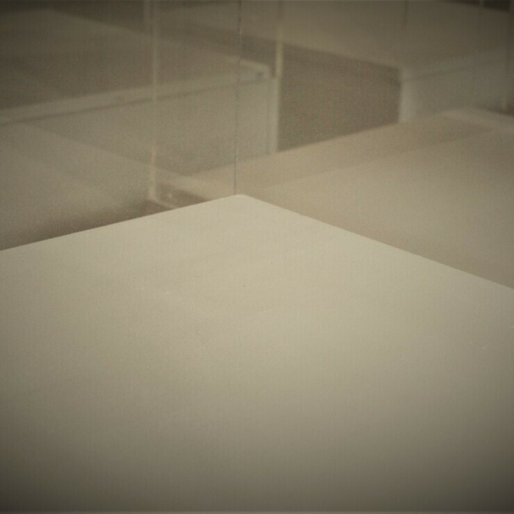 Close up of a group of exhibition plinths.
