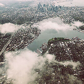 Clouds over a city seen from the sky.