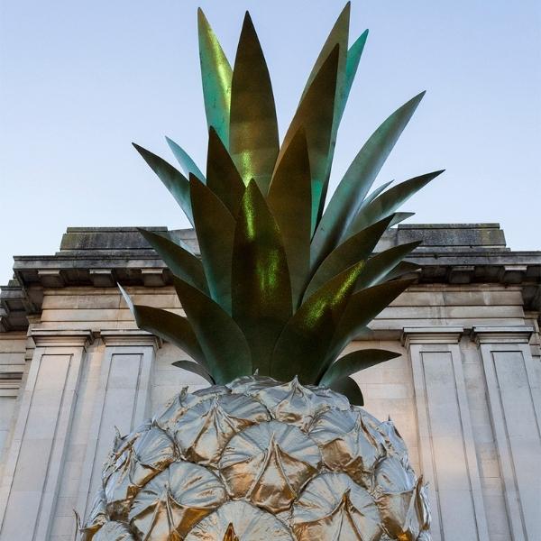 Large pineapple sculpture in front of the Fitzwilliam Museum Cambridge.