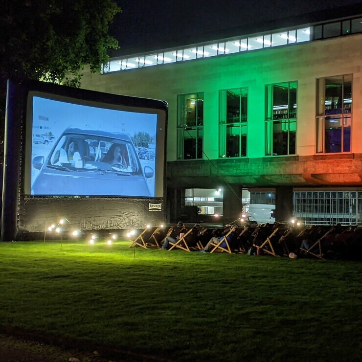 Outdoor film festival at night.