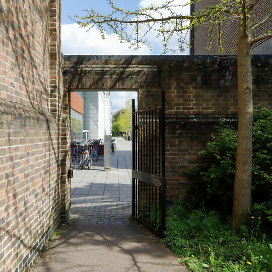 A small gate leads from the Selwyn College gardens onto the Sidgwick Site.