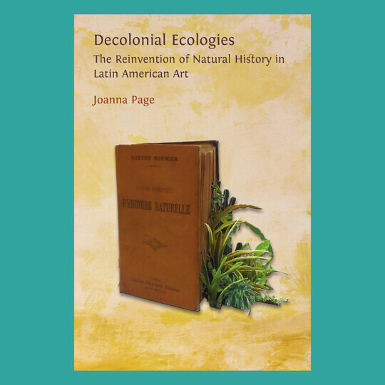 Book cover of 'Decolonial Ecologies: The Reinvention of Natural History in Latin American Art' showing an old book and a plant.